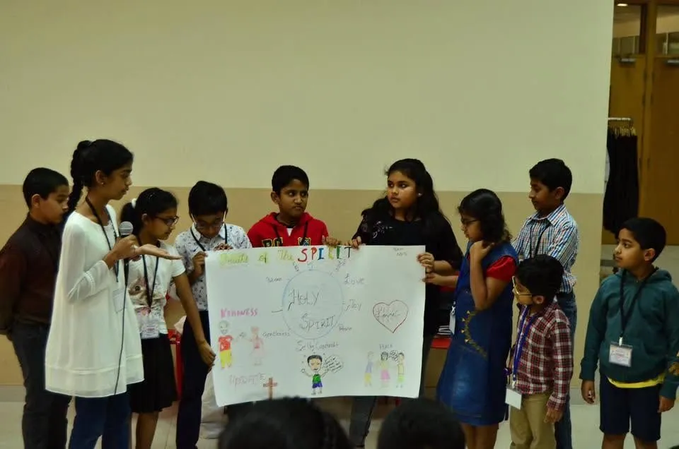 Children presenting a Fruits of the Spirit poster